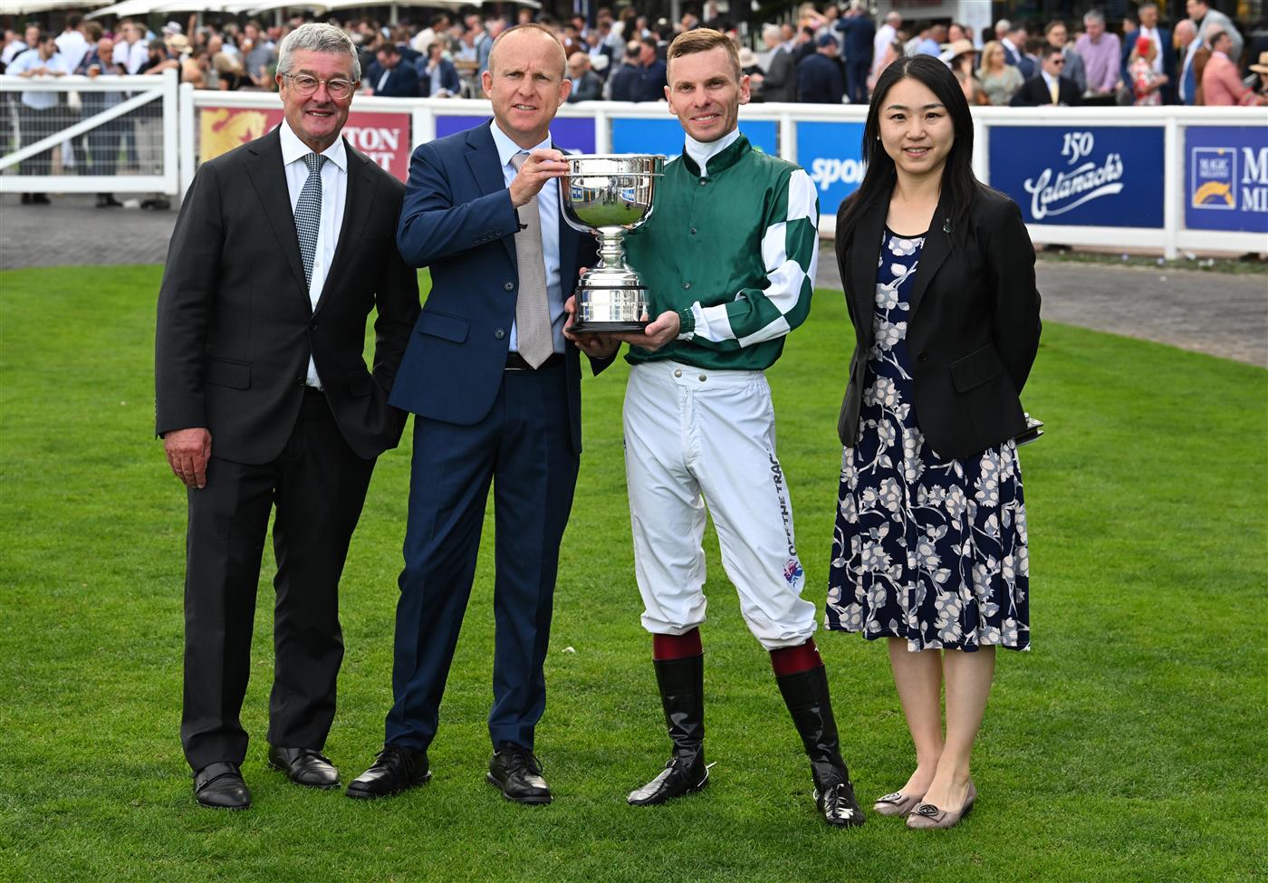 MELBOURNE, AUSTRALIA - SEPTEMBER 19: Ben Melham poses with trophy with Darren Beadman (L) and Danny Rolston of Yulong after Angel Capital won race 9, the Sportsbet Sir Rupert Clarke Stakes during Melbourne Racing at Caulfield Racecourse on September 19, 2026 in Melbourne, Australia. (Photo by Vince Caligiuri/Getty Images)