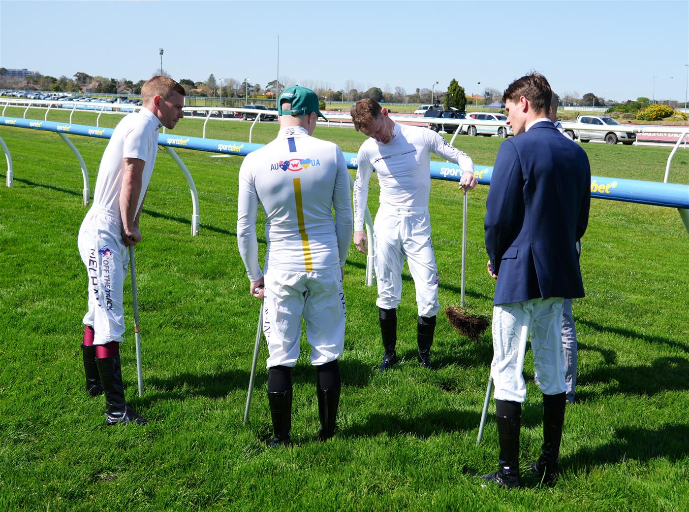MELBOURNE, AUSTRALIA - SEPTEMBER 19: Mark Zahra and fellow jockeys are seen inspecting the track before Melbourne Racing at Caulfield Racecourse on September 19, 2026 in Melbourne, Australia. (Photo by Vince Caligiuri/Getty Images)