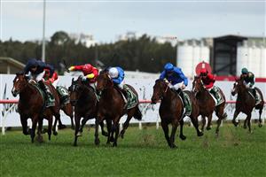 SYDNEY, AUSTRALIA - SEPTEMBER 28: James McDonald riding Broadsiding wins Race 8 James Squire Golden Rose during "Golden Rose Day" Sydney Racing at Rosehill Gardens on September 28, 2024 in Sydney, Australia. (Photo by Jeremy Ng/Getty Images)