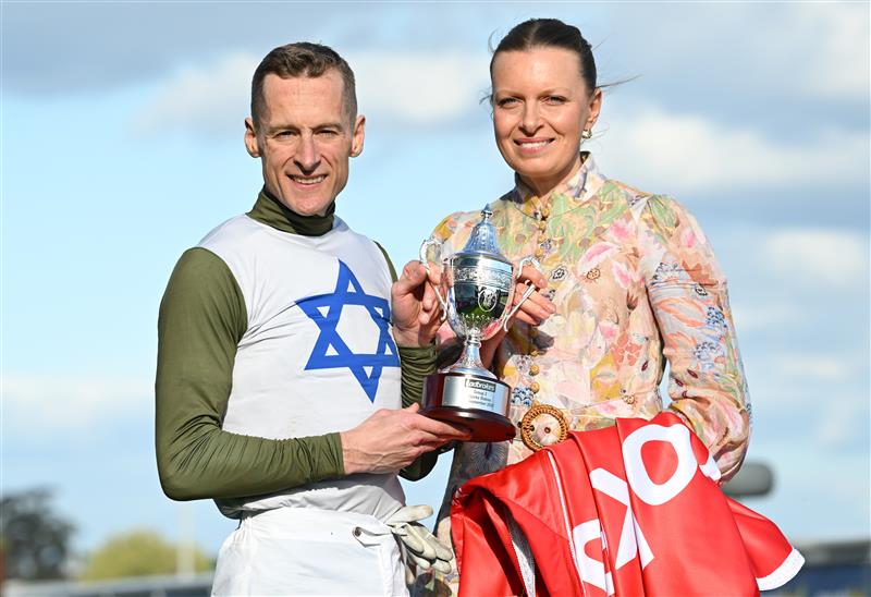 MELBOURNE, AUSTRALIA - SEPTEMBER 27: Blake Shinn poses with trainer Lucy Yeomans after riding Changing Colours to win race 7, the Ladbrokes Stocks Stakes  during Melbourne Racing at Caulfield Racecourse on September 27, 2026 in Melbourne, Australia. (Photo by Vince Caligiuri/Getty Images)