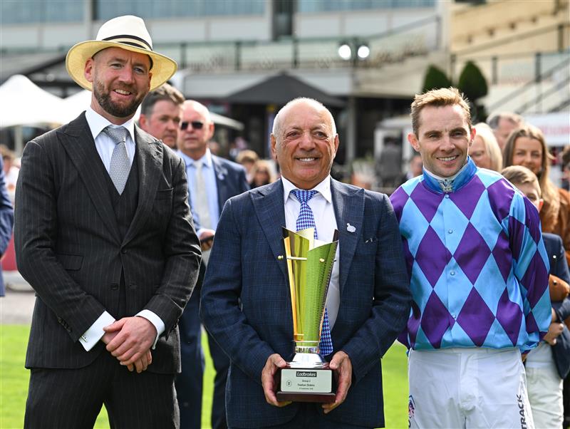 MELBOURNE, AUSTRALIA - SEPTEMBER 27: Tony Ottobre poses with trainer Ciaron Maher and jockey Declan Bates riding after Pride of Jenni won race 5, the Ladbrokes Feehan Stakes during Melbourne Racing at Caulfield Racecourse on September 27, 2026 in Melbourne, Australia. (Photo by Vince Caligiuri/Getty Images)