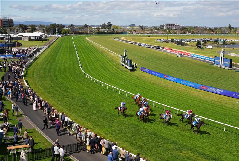 MELBOURNE, AUSTRALIA - SEPTEMBER 27: General view of Michael Dee riding Regal Ambition winning race 2, the Sportsbet Jim Moloney Stakes with the rail out thirteen metres during Melbourne Racing at Caulfield Racecourse on September 27, 2026 in Melbourne, Australia. (Photo by Vince Caligiuri/Getty Images)