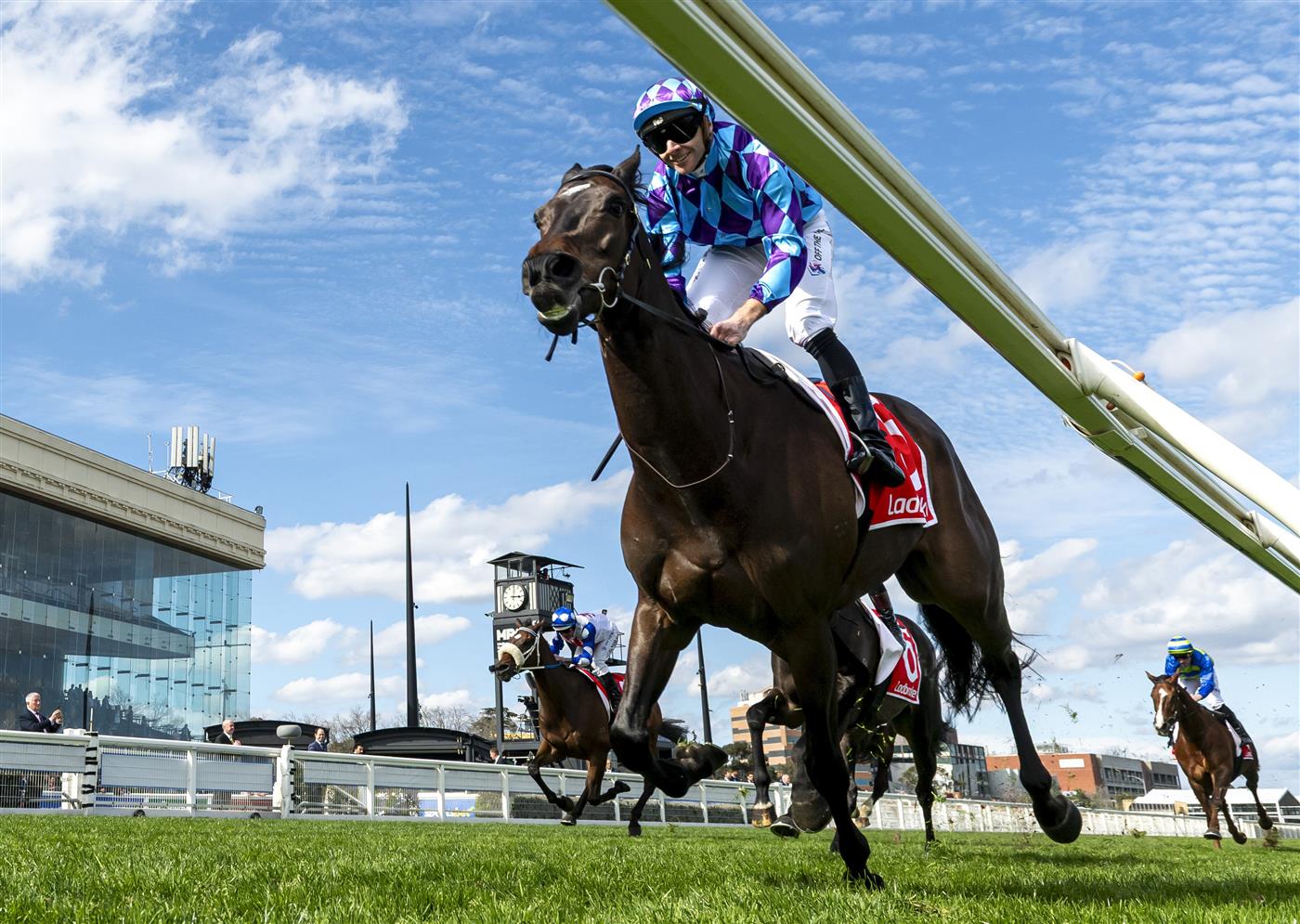 MELBOURNE, AUSTRALIA - SEPTEMBER 27: Declan Bates riding Pride of Jenni smiling on the line winning race 5, the Ladbrokes Feehan Stakes during Melbourne Racing at Caulfield Racecourse on September 27, 2026 in Melbourne, Australia. (Photo by Vince Caligiuri/Getty Images)