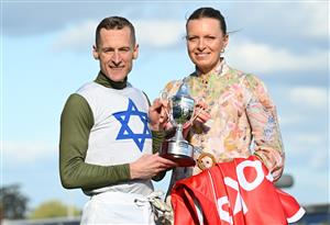 MELBOURNE, AUSTRALIA - SEPTEMBER 27: Blake Shinn poses with trainer Lucy Yeomans after riding Changing Colours to win race 7, the Ladbrokes Stocks Stakes  during Melbourne Racing at Caulfield Racecourse on September 27, 2026 in Melbourne, Australia. (Photo by Vince Caligiuri/Getty Images)