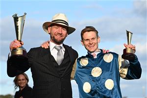 MELBOURNE, AUSTRALIA - SEPTEMBER 27: Ethan Brown and trainer Ciaron Maher pose with trophy after Jimmysstar won race 8, the Ladbrokes Manikato Stakes  during Melbourne Racing at Caulfield Racecourse on September 27, 2026 in Melbourne, Australia. (Photo by Vince Caligiuri/Getty Images)