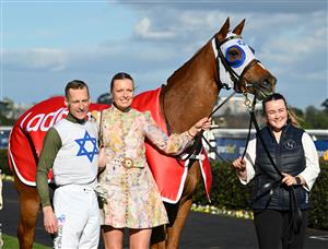 MELBOURNE, AUSTRALIA - SEPTEMBER 27: Blake Shinn poses with trainer Lucy Yeomans after riding Changing Colours to win race 7, the Ladbrokes Stocks Stakes  during Melbourne Racing at Caulfield Racecourse on September 27, 2026 in Melbourne, Australia. (Photo by Vince Caligiuri/Getty Images)