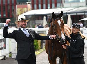 MELBOURNE, AUSTRALIA - SEPTEMBER 27: Trainer Ciaron Maher poses with Over The Bridge after winning race 4, the Dominant Scarborough Stakes during Melbourne Racing at Caulfield Racecourse on September 27, 2026 in Melbourne, Australia. (Photo by Vince Caligiuri/Getty Images)