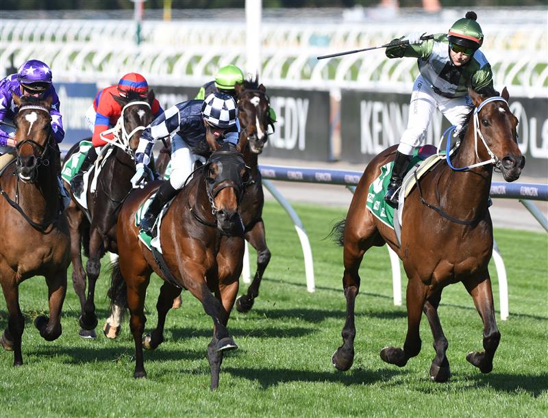 MELBOURNE, AUSTRALIA - OCTOBER 02: Brett Prebble riding Incentivise defeats Daniel Moor riding Young Werther in Race 7, the Tab Turnbull Stakes, during Melbourne Racing at Flemington Racecourse on October 02, 2021 in Melbourne, Australia. (Photo by Vince Caligiuri/Getty Images)