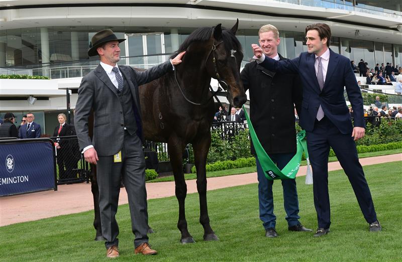 MELBOURNE, AUSTRALIA - OCTOBER 07: Trainers Ciaron Maher and David Eustace pose with Gold Trip after winning Race 8, the Tab Turnbull Stakes, during Melbourne Racing at Flemington Racecourse on October 07, 2023 in Melbourne, Australia. (Photo by Vince Caligiuri/Getty Images)