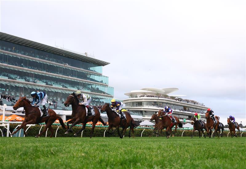 MELBOURNE, AUSTRALIA - OCTOBER 03: Ben Melham rides #15 Skybird to win ace 9, the Gilgai Stakes during Turnbull Stakes Day at Flemington Racecourse on October 03, 2026 in Melbourne, Australia. (Photo by Robert Cianflone/Getty Images)