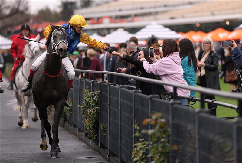 MELBOURNE, AUSTRALIA - OCTOBER 03: Craig Williams riding #20 Hankee Alpha celebrates after winning race 2, the Tab One Pool during Turnbull Stakes Day at Flemington Racecourse on October 03, 2026 in Melbourne, Australia. (Photo by Robert Cianflone/Getty Images)