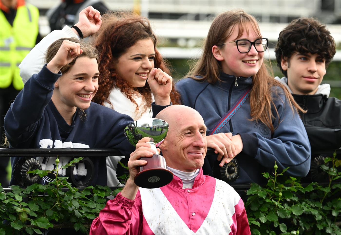 MELBOURNE, AUSTRALIA - OCTOBER 03: William Pike poses with trophy after riding Cosmic Crusader to win race 8, the Tab Turnbull Stakes  during Turnbull Stakes Day at Flemington Racecourse on October 03, 2026 in Melbourne, Australia. (Photo by Vince Caligiuri/Getty Images)