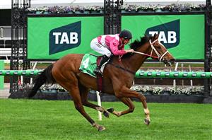 MELBOURNE, AUSTRALIA - OCTOBER 03: William Pike riding Cosmic Crusader winning race 8, the Tab Turnbull Stakes  during Turnbull Stakes Day at Flemington Racecourse on October 03, 2026 in Melbourne, Australia. (Photo by Vince Caligiuri/Getty Images)