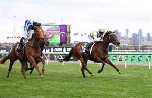 MELBOURNE, AUSTRALIA - OCTOBER 03: Ben Melham rides #15 Skybird to win ace 9, the Gilgai Stakes during Turnbull Stakes Day at Flemington Racecourse on October 03, 2026 in Melbourne, Australia. (Photo by Robert Cianflone/Getty Images)