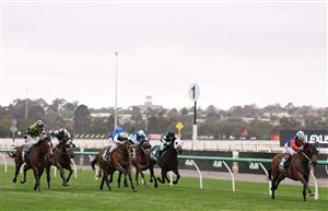 MELBOURNE, AUSTRALIA - OCTOBER 03: Craig Williams rides #14 Miss Waititi to win race 3, the Howden Super Impose Stakes during Turnbull Stakes Day at Flemington Racecourse on October 03, 2026 in Melbourne, Australia. (Photo by Robert Cianflone/Getty Images)