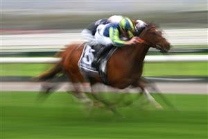 MELBOURNE, AUSTRALIA - OCTOBER 03: Declan Bates riding Cote Atlantique winning race 10, the Hkjc World Pool Paris Lane Stakes during Turnbull Stakes Day at Flemington Racecourse on October 03, 2026 in Melbourne, Australia. (Photo by Vince Caligiuri/Getty Images)