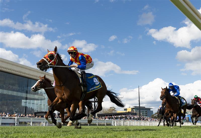 MELBOURNE, AUSTRALIA - OCTOBER 11: Damian Lane riding Autumn Boy winning Race 8, the Sportsbet Caulfield Guineas during Melbourne Racing at Caulfield Racecourse on October 11, 2025 in Melbourne, Australia. (Photo by Vince Caligiuri/Getty Images)