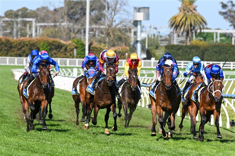 MELBOURNE, AUSTRALIA - OCTOBER 12: Damian Lane riding Private Life (r) defeats Billy Egan riding Feroce and Evaporate, James McDonald riding Broadsiding (L) was unplaced in Race 8, the Sportsbet Caulfield Guineas - Betting Odds during Melbourne Racing at Caulfield Racecourse on October 12, 2024 in Melbourne, Australia. (Photo by Vince Caligiuri/Getty Images)