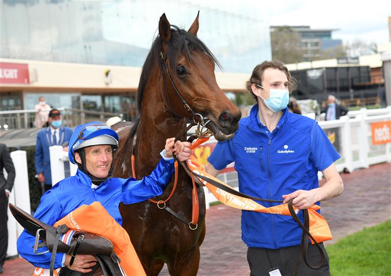 MELBOURNE, AUSTRALIA - OCTOBER 09: Damien Oliver riding Anamoe after winning Race 8, the Neds Caulfield Guineas, winning during Melbourne Racing at Caulfield Racecourse on October 09, 2021 in Melbourne, Australia. (Photo by Vince Caligiuri/Getty Images)