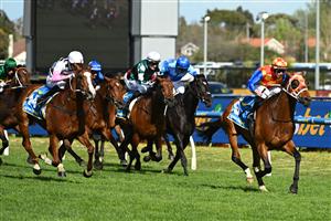 MELBOURNE, AUSTRALIA - OCTOBER 11: Damian Lane riding Autumn Boy defeats Planet Red in Race 8, the Sportsbet Caulfield Guineas during Melbourne Racing at Caulfield Racecourse on October 11, 2025 in Melbourne, Australia. (Photo by Vince Caligiuri/Getty Images)