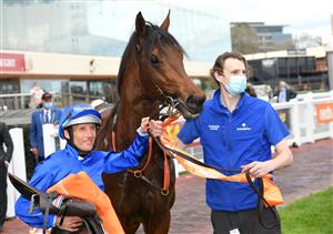 MELBOURNE, AUSTRALIA - OCTOBER 09: Damien Oliver riding Anamoe after winning Race 8, the Neds Caulfield Guineas, winning during Melbourne Racing at Caulfield Racecourse on October 09, 2021 in Melbourne, Australia. (Photo by Vince Caligiuri/Getty Images)