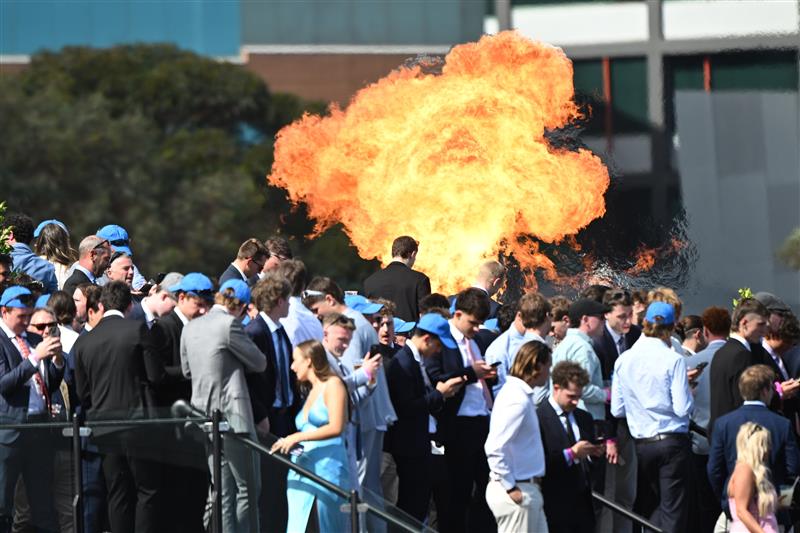 MELBOURNE, AUSTRALIA - OCTOBER 10:  Sportsbet promotion fire display during race 7, the Sportsbet Might And Power during Melbourne Racing at Caulfield Racecourse on October 10, 2026 in Melbourne, Australia. (Photo by Vince Caligiuri/Getty Images)