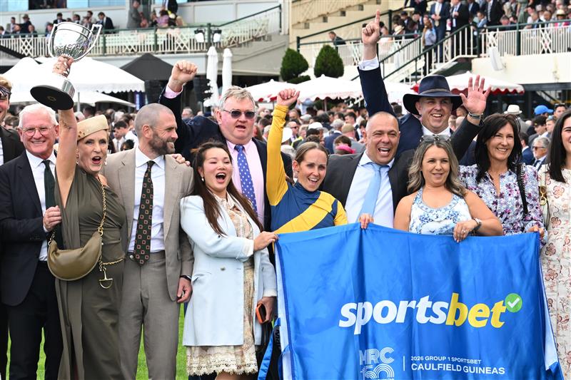 MELBOURNE, AUSTRALIA - OCTOBER 10: Rachel King celebrates with connections after riding Warwoven to win race 8, the Sportsbet Caulfield Guineas during Melbourne Racing at Caulfield Racecourse on October 10, 2026 in Melbourne, Australia. (Photo by Vince Caligiuri/Getty Images)