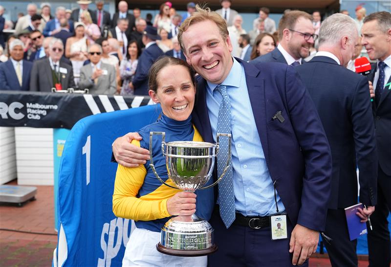 MELBOURNE, AUSTRALIA - OCTOBER 10: Rachel King celebrates with Jim Clarke after riding Warwoven to win race 8, the Sportsbet Caulfield Guineas during Melbourne Racing at Caulfield Racecourse on October 10, 2026 in Melbourne, Australia. (Photo by Vince Caligiuri/Getty Images)
