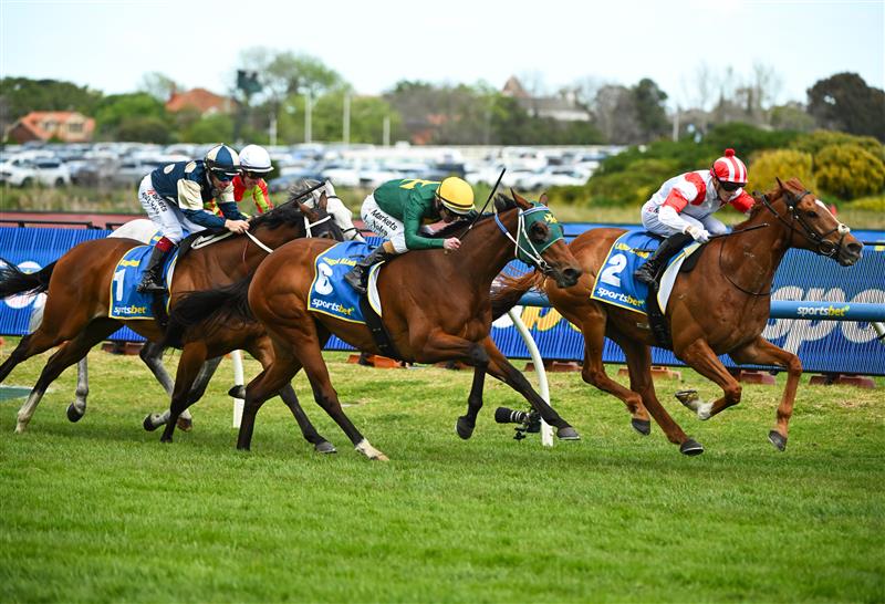 MELBOURNE, AUSTRALIA - OCTOBER 10: Ethan Brown riding  Land Legend defeats Luke Nolen riding Sheza Alibi and Birdman  (3rd) in race 7, the Sportsbet Might And Power during Melbourne Racing at Caulfield Racecourse on October 10, 2026 in Melbourne, Australia. (Photo by Vince Caligiuri/Getty Images)