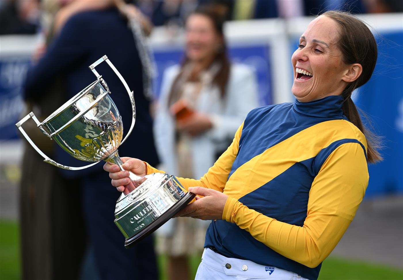 MELBOURNE, AUSTRALIA - OCTOBER 10: Rachel King poses with trophy after riding Warwoven to win race 8, the Sportsbet Caulfield Guineas during Melbourne Racing at Caulfield Racecourse on October 10, 2026 in Melbourne, Australia. (Photo by Vince Caligiuri/Getty Images)