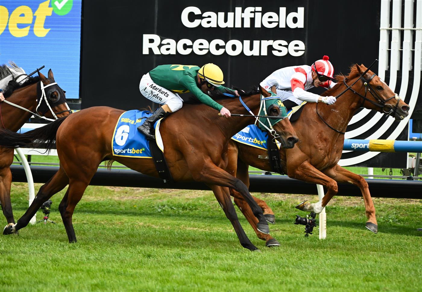 MELBOURNE, AUSTRALIA - OCTOBER 10: Ethan Brown riding  Land Legend defeats Luke Nolen riding Sheza Alibi in race 7, the Sportsbet Might And Power during Melbourne Racing at Caulfield Racecourse on October 10, 2026 in Melbourne, Australia. (Photo by Vince Caligiuri/Getty Images)
