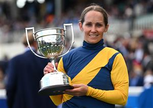 MELBOURNE, AUSTRALIA - OCTOBER 10: Rachel King poses with trophy after riding Warwoven to win race 8, the Sportsbet Caulfield Guineas during Melbourne Racing at Caulfield Racecourse on October 10, 2026 in Melbourne, Australia. (Photo by Vince Caligiuri/Getty Images)