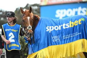 MELBOURNE, AUSTRALIA - OCTOBER 10: Land Legend after winning race 7, the Sportsbet Might And Power during Melbourne Racing at Caulfield Racecourse on October 10, 2026 in Melbourne, Australia. (Photo by Vince Caligiuri/Getty Images)