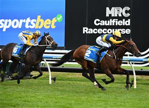 MELBOURNE, AUSTRALIA - OCTOBER 10: Rachel King riding Warwoven defeats Blake Shinn riding Blind Raise in race 8, the Sportsbet Caulfield Guineas during Melbourne Racing at Caulfield Racecourse on October 10, 2026 in Melbourne, Australia. (Photo by Vince Caligiuri/Getty Images)