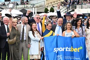 MELBOURNE, AUSTRALIA - OCTOBER 10: Rachel King celebrates with connections after riding Warwoven to win race 8, the Sportsbet Caulfield Guineas during Melbourne Racing at Caulfield Racecourse on October 10, 2026 in Melbourne, Australia. (Photo by Vince Caligiuri/Getty Images)