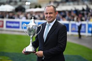 MELBOURNE, AUSTRALIA - OCTOBER 10: Trainer Chris Waller poses with trophy after Lady Shenandoah won race 9, the Hyland Race Colours Toorak Handicap  during Melbourne Racing at Caulfield Racecourse on October 10, 2026 in Melbourne, Australia. (Photo by Vince Caligiuri/Getty Images)
