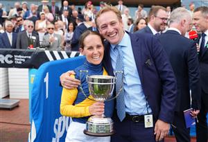 MELBOURNE, AUSTRALIA - OCTOBER 10: Rachel King celebrates with Jim Clarke after riding Warwoven to win race 8, the Sportsbet Caulfield Guineas during Melbourne Racing at Caulfield Racecourse on October 10, 2026 in Melbourne, Australia. (Photo by Vince Caligiuri/Getty Images)