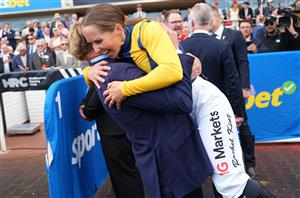 MELBOURNE, AUSTRALIA - OCTOBER 10: Rachel King celebrates with Jim Clarke after riding Warwoven to win race 8, the Sportsbet Caulfield Guineas during Melbourne Racing at Caulfield Racecourse on October 10, 2026 in Melbourne, Australia. (Photo by Vince Caligiuri/Getty Images)