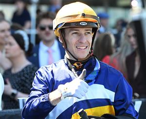 MELBOURNE, AUSTRALIA - OCTOBER 10: Jordan Childs after riding Surfin' Bird to win Race 3 on Caulfield Guineas Day. (Getty)