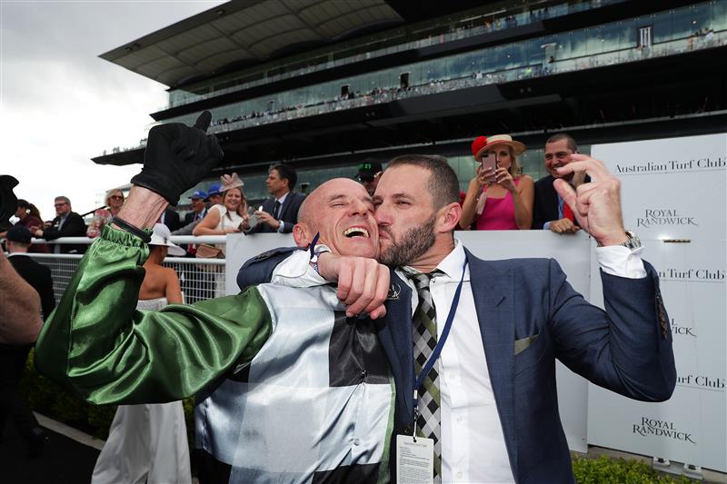 SYDNEY, AUSTRALIA - OCTOBER 19: Jockey Glen Boss celebrates with connections after riding Yes Yes Yes to victory in race 7 The TAB Everest during The Everest at Royal Randwick Racecourse on October 19, 2019 in Sydney, Australia. (Photo by Mark Metcalfe/Getty Images)
