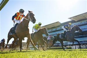 SYDNEY, AUSTRALIA - OCTOBER 16: James McDonald on Nature Strip (L) wins the Everest during Sydney Racing at Royal Randwick Racecourse on October 16, 2021 in Sydney, Australia. (Photo by Mark Evans/Getty Images)