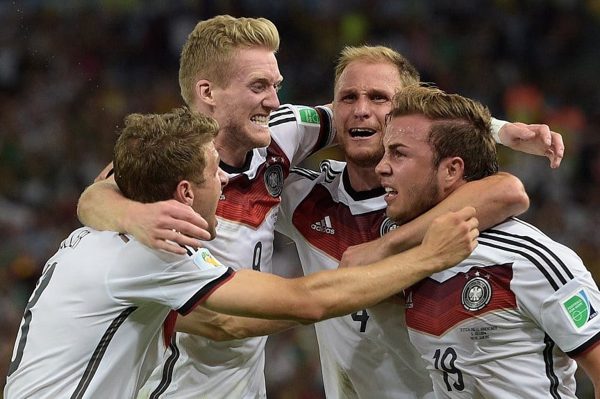 Germany's Thomas Muller, Andre Schurrle, Benedikt Hoewedes and Mario Goetze celebrate after Gotze
scores the winner against Argentina in Brazil (Juan Mabromata/AFP/Getty Images)