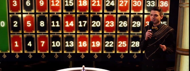Male dealer at lightning roulette table