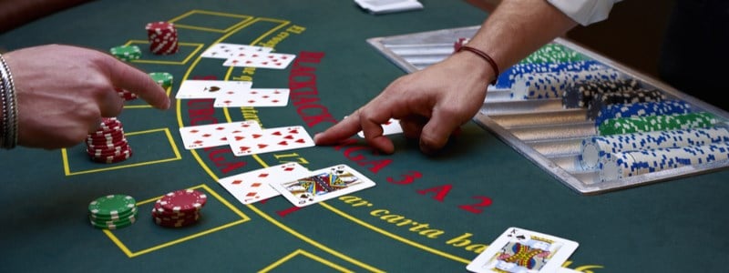 Blackjack dealer showing cards