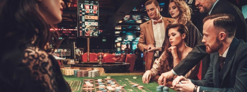 Gamblers at roulette table Gamblers at roulette table