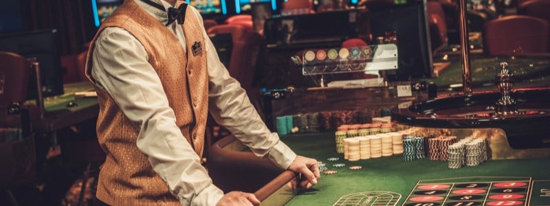 Live dealer at the roulette table