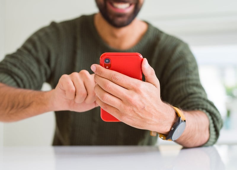 UAE man playing mobile casino