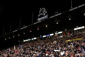 SYDNEY, AUSTRALIA - OCTOBER 02: Spectators watch the NRL Qualifying Final match between the Penrith Panthers and the Sydney Roosters at Panthers Stadium on October 02, 2020 in Sydney, Australia. (Photo by Cameron Spencer/Getty Images)