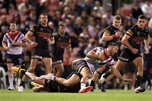 SYDNEY, AUSTRALIA - OCTOBER 02: James Tedesco of the Roosters is tackled during the NRL Qualifying Final match between the Penrith Panthers and the Sydney Roosters at Panthers Stadium on October 02, 2020 in Sydney, Australia. (Photo by Cameron Spencer/Getty Images)