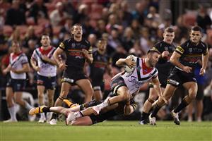 SYDNEY, AUSTRALIA - OCTOBER 02: James Tedesco of the Roosters is tackled during the NRL Qualifying Final match between the Penrith Panthers and the Sydney Roosters at Panthers Stadium on October 02, 2020 in Sydney, Australia. (Photo by Cameron Spencer/Getty Images)